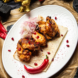 Крылья цыпленка в остром соусе шрирача